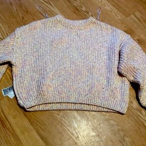 Divided size medium sweater worn one time